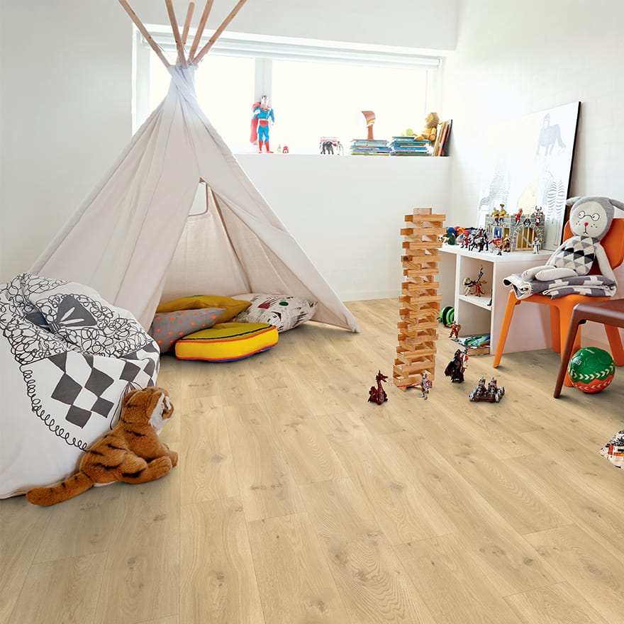 children room with toys on a beige vinyl floor